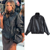 Chic black faux leather moto jacket for women, perfect for autumn evenings and stylish casual wear. Durable and fashionable.