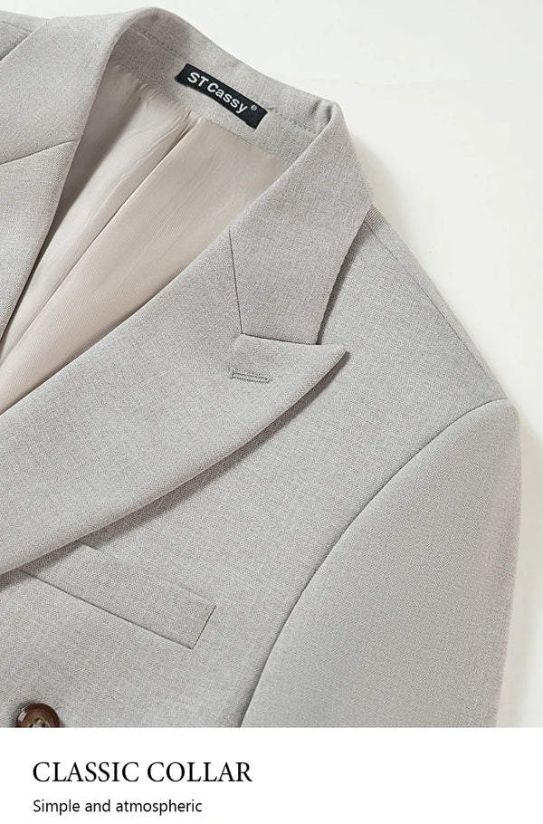 Model walking confidently in the Midnight Poise suit, perfect for impactful dress.