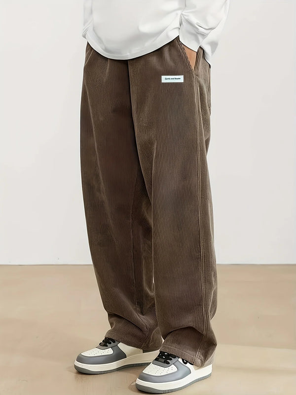 Textured corduroy drawstring pants showing soft fabric detail and comfortable relaxed cut