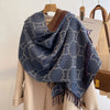 Timeless winter accessory: Winter Whisper cashmere shawl in a cozy, elegant design.