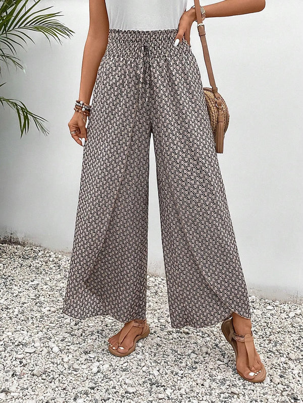 Floral wide-leg chiffon pants for women, ankle-length, elastic waist, perfect for summer fashion and casual chic outfits.