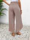 Floral wide-leg chiffon pants for women, ankle-length, elastic waist, perfect for summer fashion and casual chic outfits.