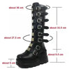 Gothic knee-high platform boots for women with wedge heel, buckle closure, perfect for Halloween, cosplay, and edgy fashion.