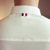 Elegant men's slim-fit dress shirt in solid color, perfect for spring, featuring a turn-down collar and long sleeves.