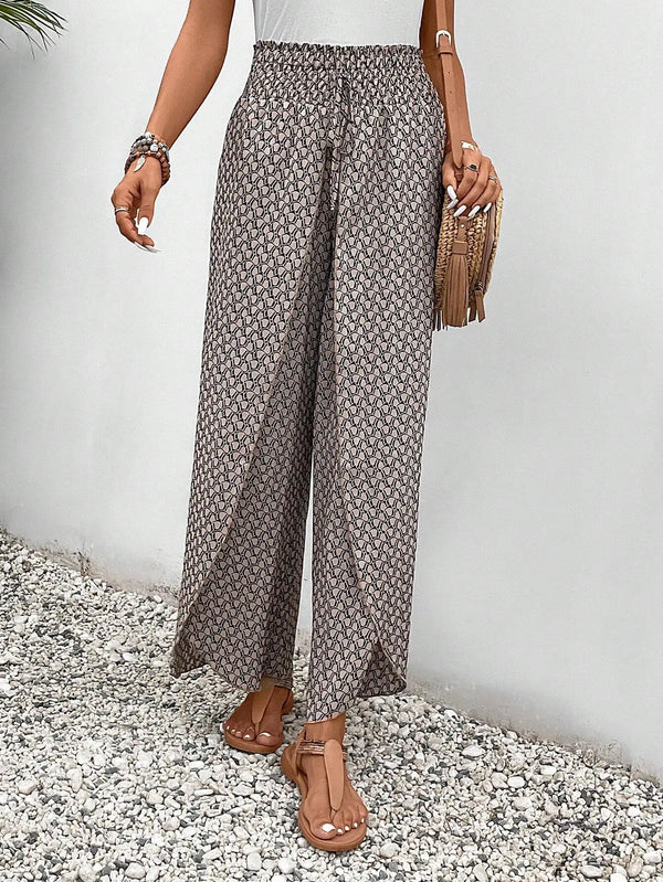 Floral wide-leg chiffon pants for women, ankle-length, elastic waist, perfect for summer fashion and casual chic outfits.