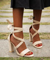 Sophisticated navy blue stiletto sandals with a sleek design.