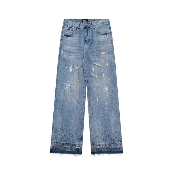 Trendy washed and ripped wide-leg women's jeans with distressed ink-splashed finish for a chic, casual look.