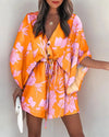 Floral bohemian dress showing loose comfortable fit and vibrant summer print pattern