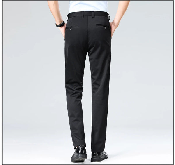 Navy stretch dress pants styled with blazer for polished boardroom appearance