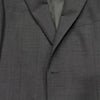 Wrinkle-resistant Super 150 wool suit displayed on a mannequin, emphasizing seasonless versatility and elegance.