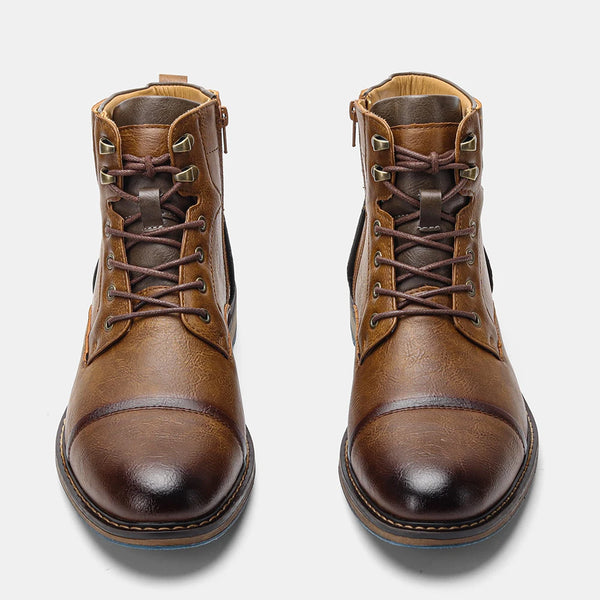 Rugged ankle boots in genuine leather with modern zipper and low heel