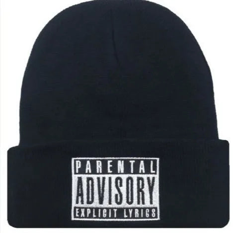 Lifestyle shot of Urban Pulse Knit Cap worn in a vibrant city setting.