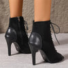 Modern lace-up boots featuring dramatic height and hollow-out fashion elements