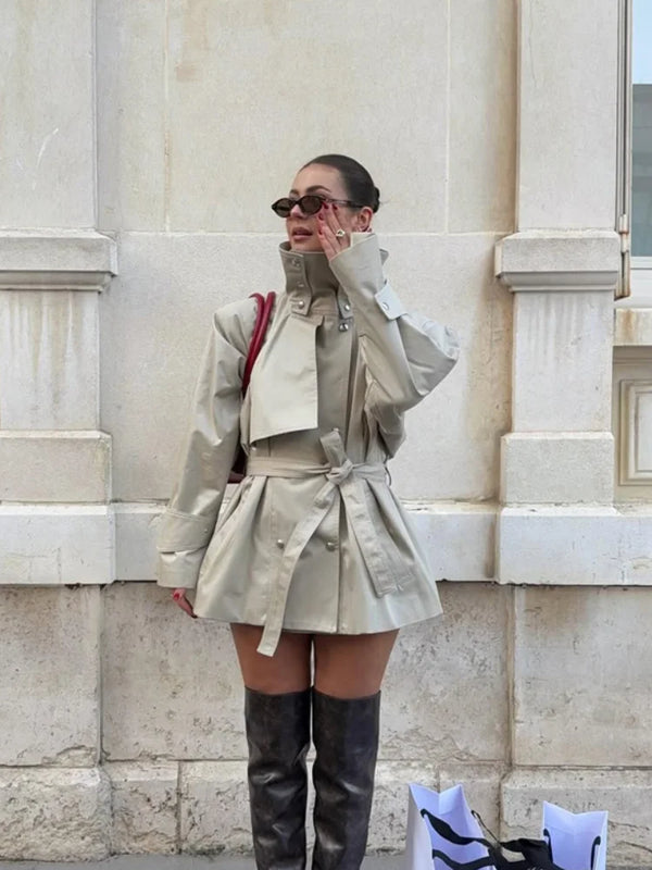 Women's classic khaki trench coat featuring elevated stand collar and tailored waist