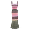 Detail shot of the viscose fabric of the zigzag maxi dress, highlighting its luxurious feel.