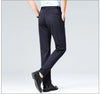 Full-body shot of slim-fit breathable pants creating streamlined professional silhouette