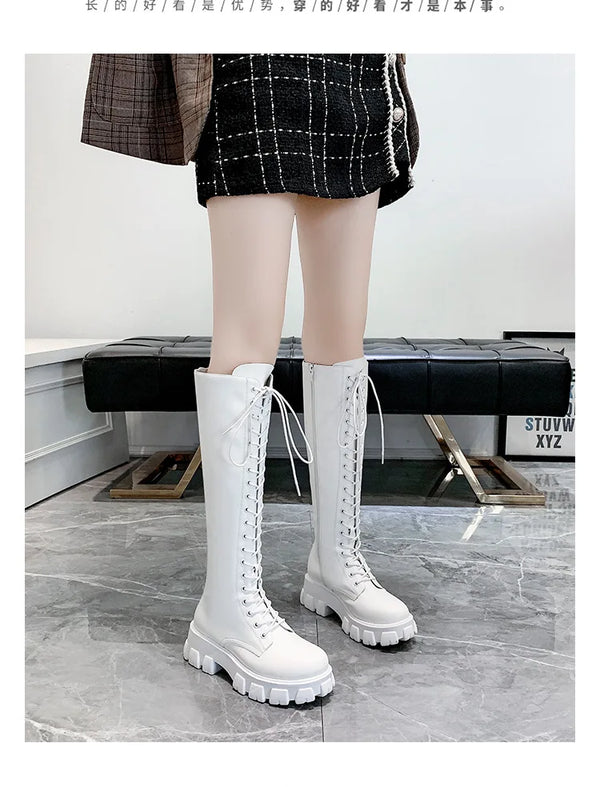 Stylish ankle high women's boots with lace-up closure, thick heel, non-slip rubber sole, perfect for fall and winter fashion.