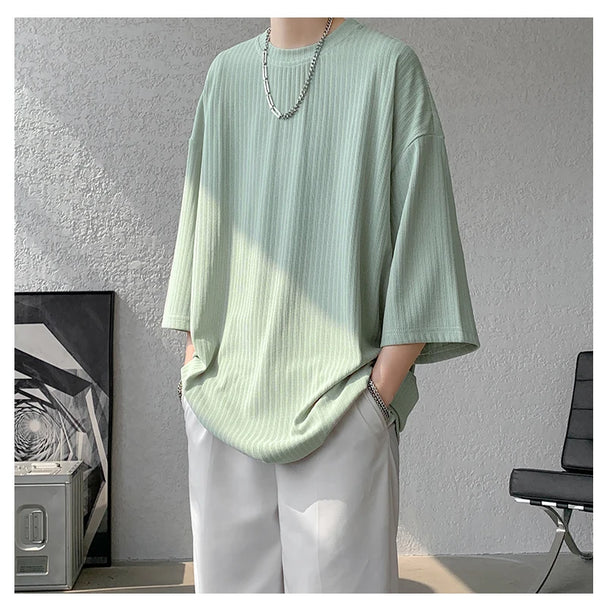 Lifestyle shot of striped tee worn at a picnic, ideal for relaxed summer days.