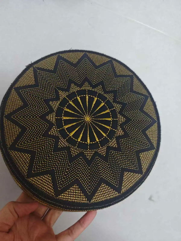 Premium flat-top kufi cap showcasing intricate gold geometric patterns for men