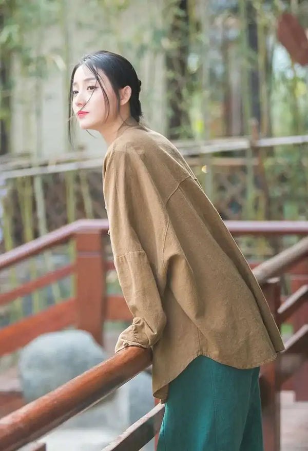 Elegant cotton linen coat with stand collar neckline and single-breasted front