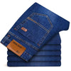 Straight-leg men's jeans in timeless blue denim with stretch technology and full-length versatile design