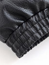 Chic black faux leather moto jacket for women, perfect for autumn evenings and stylish casual wear. Durable and fashionable.