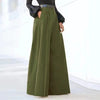 Chic wide leg palazzo pants for women in nylon-cotton blend, featuring pockets and button detail for stylish comfort.