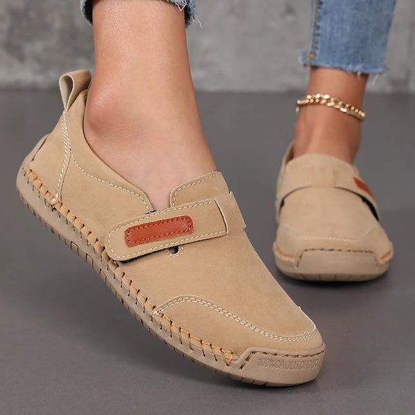 Versatile leather loafers paired with summer sundress for effortless weekend elegance