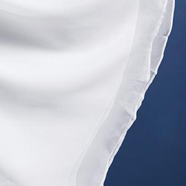 Flowing summer trousers in vibrant teal, designed for comfort and style in warm weather.