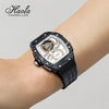 Elegant women's watch featuring a unique tonneau case and rubber band.