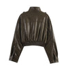 Chic army green faux leather jacket for women with stand collar, loose fit, and functional pockets for stylish winter wear.