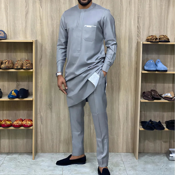 Side view of African heritage two-piece showing patchwork detail and relaxed fit silhouette