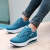 Stride Higher Chunky Platform Wedge Sneakers in white with lace-up closure