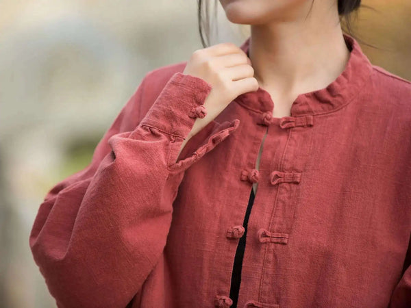 Timeless stand collar coat in cotton-linen blend with minimalist aesthetic