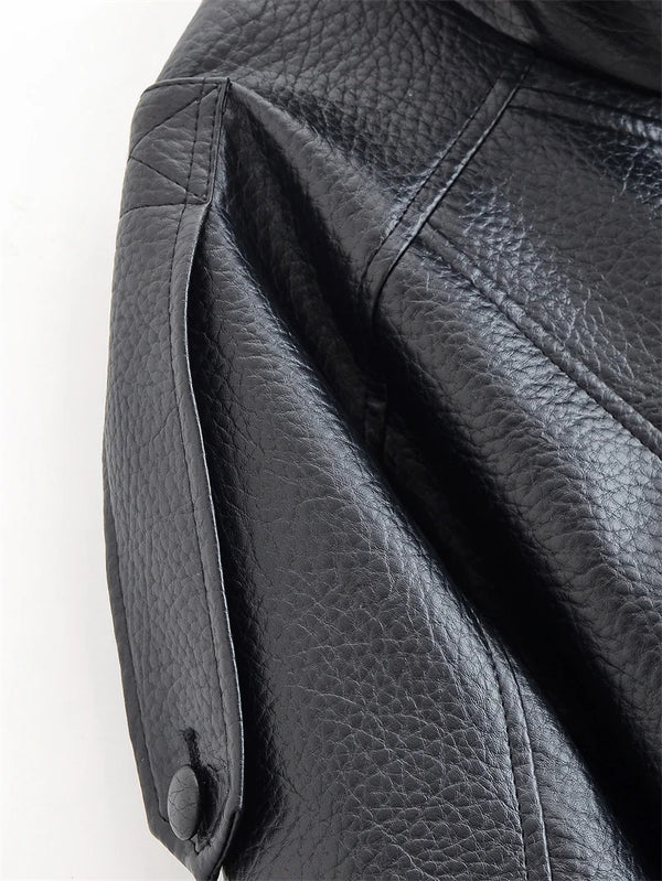 Chic black faux leather moto jacket for women, perfect for autumn evenings and stylish casual wear with functional pockets.