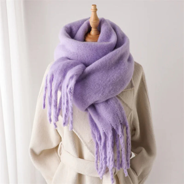 Cozy cashmere-feel scarf in deep plum with chic tassels.