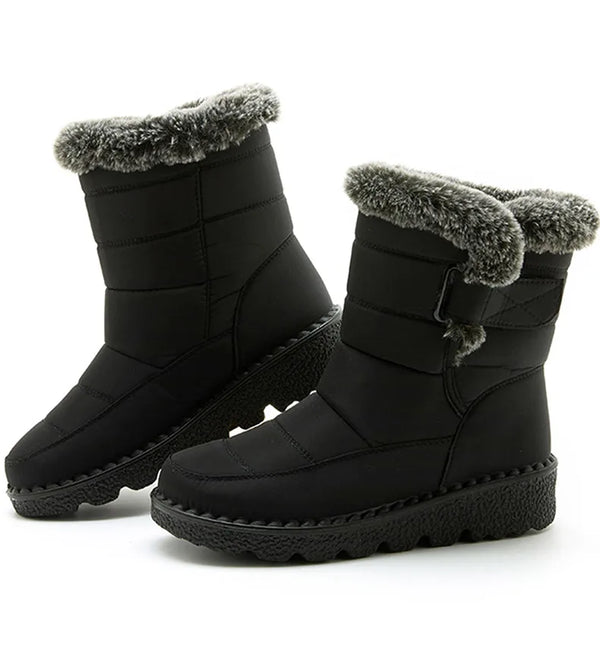 Chic women's waterproof winter boots with plush lining, low heel, and secure hook-and-loop closure for cold weather comfort.