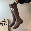Chic women's knee-high boots with thick sole, stylish PU upper, and rounded toe for winter elegance and comfort.
