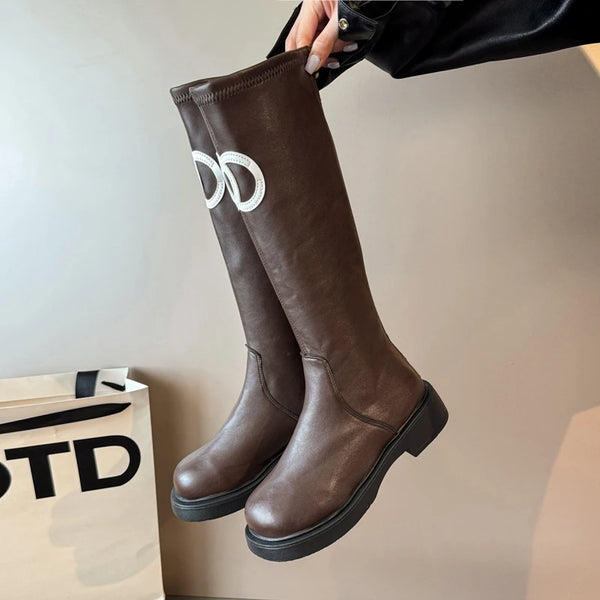 Chic women's knee-high boots with thick sole, stylish PU upper, and rounded toe for winter elegance and comfort.