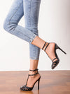 Chic and elegant stiletto sandals with ankle strap support.