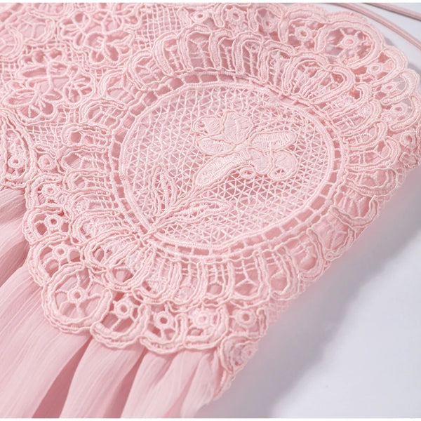 Intricate printed lace pattern detail on sleeveless formal top