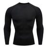 Men's breathable compression fitness t-shirt in black, perfect for workouts, running, and casual wear with moisture-wicking f