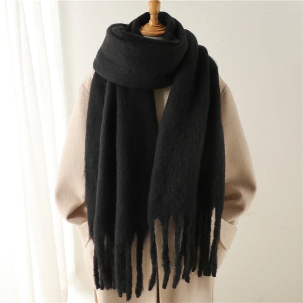 Cozy winter scarf in soft taupe, perfect for draping.