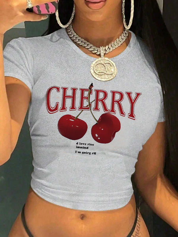 Short sleeve cherry printed crop top in tight fit silhouette perfect for high-waisted bottoms