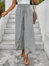 Floral wide-leg chiffon pants for women, ankle-length, elastic waist, perfect for summer fashion and casual chic outfits.