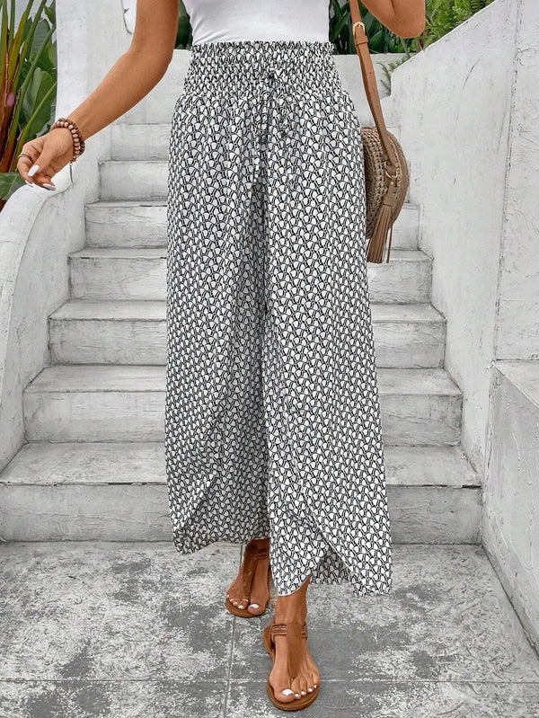Floral wide-leg chiffon pants for women, ankle-length, elastic waist, perfect for summer fashion and casual chic outfits.