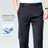 Charcoal business pants with flat front and zipper fly in professional office setting