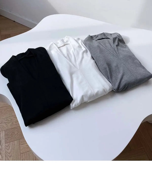 Elegant V-Neck Women's Blouse with Long Sleeves in solid color, perfect for casual and office wear, made from cotton-polyeste