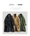 Men's military green slim fit trench coat with double-breasted closure and notched lapel, perfect for spring and autumn wear.