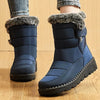 Chic women's waterproof winter boots with plush lining, low heel, and hook-and-loop closure for stylish cold weather comfort.